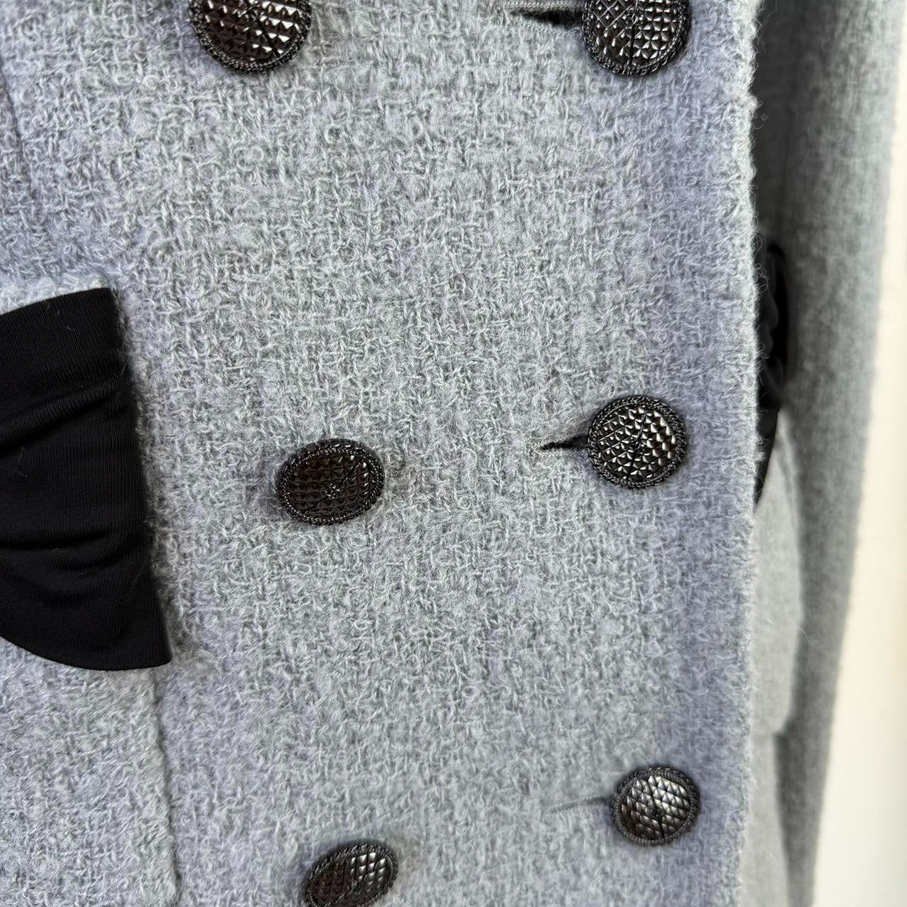 Authentic Chanel Gray wool blend blazer with black bow detail, size 38
