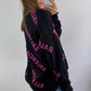 Balenciaga black sweater with pink 'BALENCIAGA'