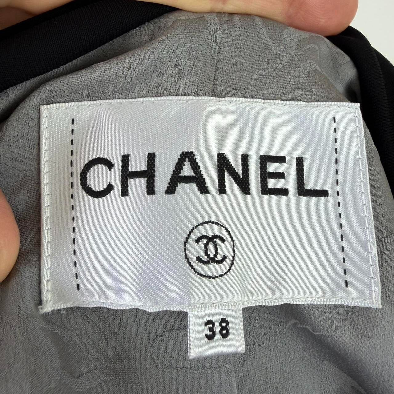 Authentic Chanel Gray wool blend blazer with black bow detail, size 38