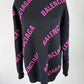 Balenciaga black sweater with pink 'BALENCIAGA'