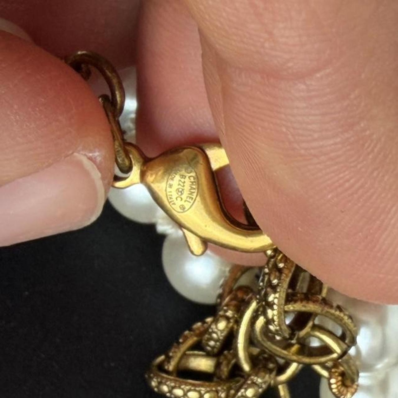 Chanel white pearl necklace with gold hardware and crystal accents