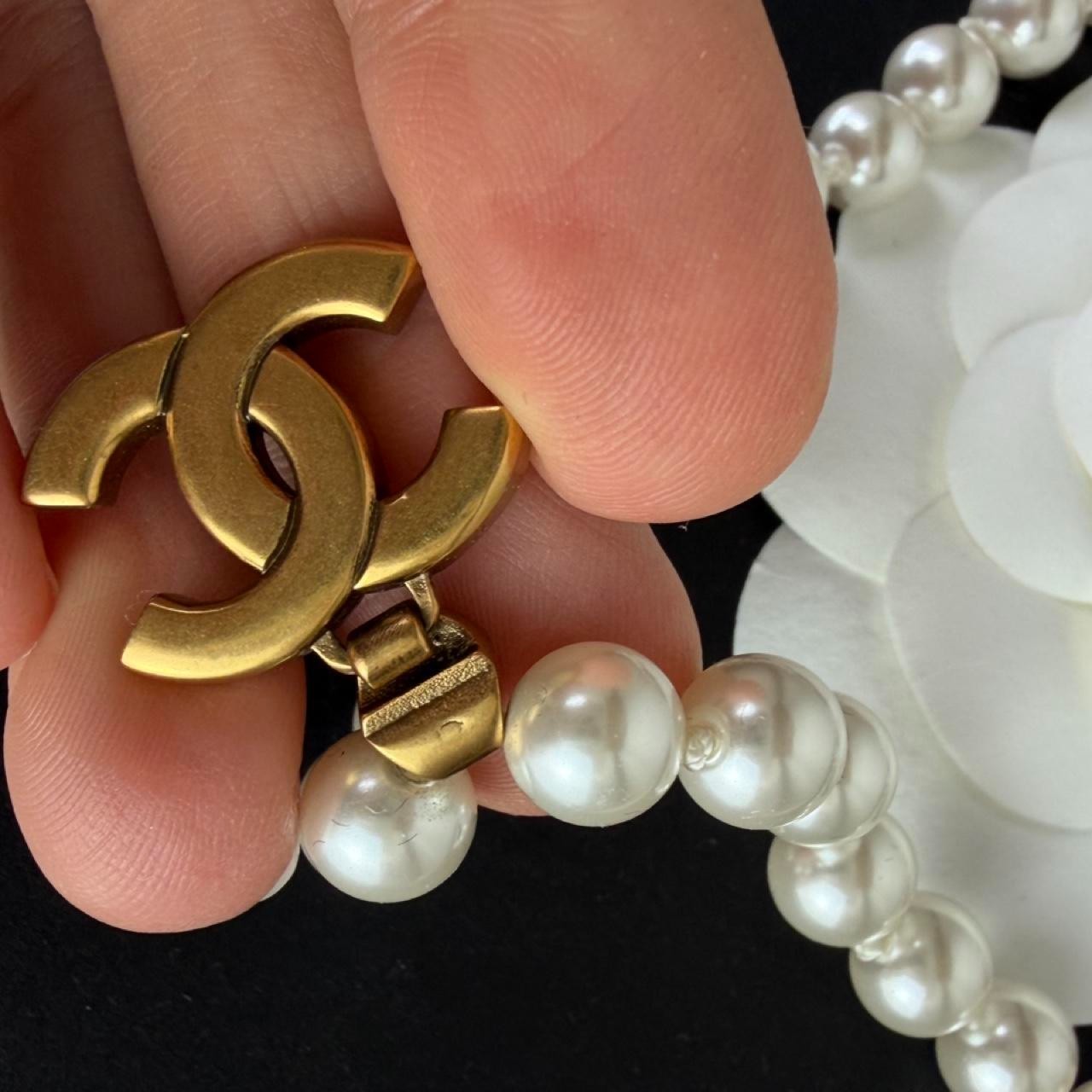 Chanel white pearl necklace with gold hardware and crystal accents