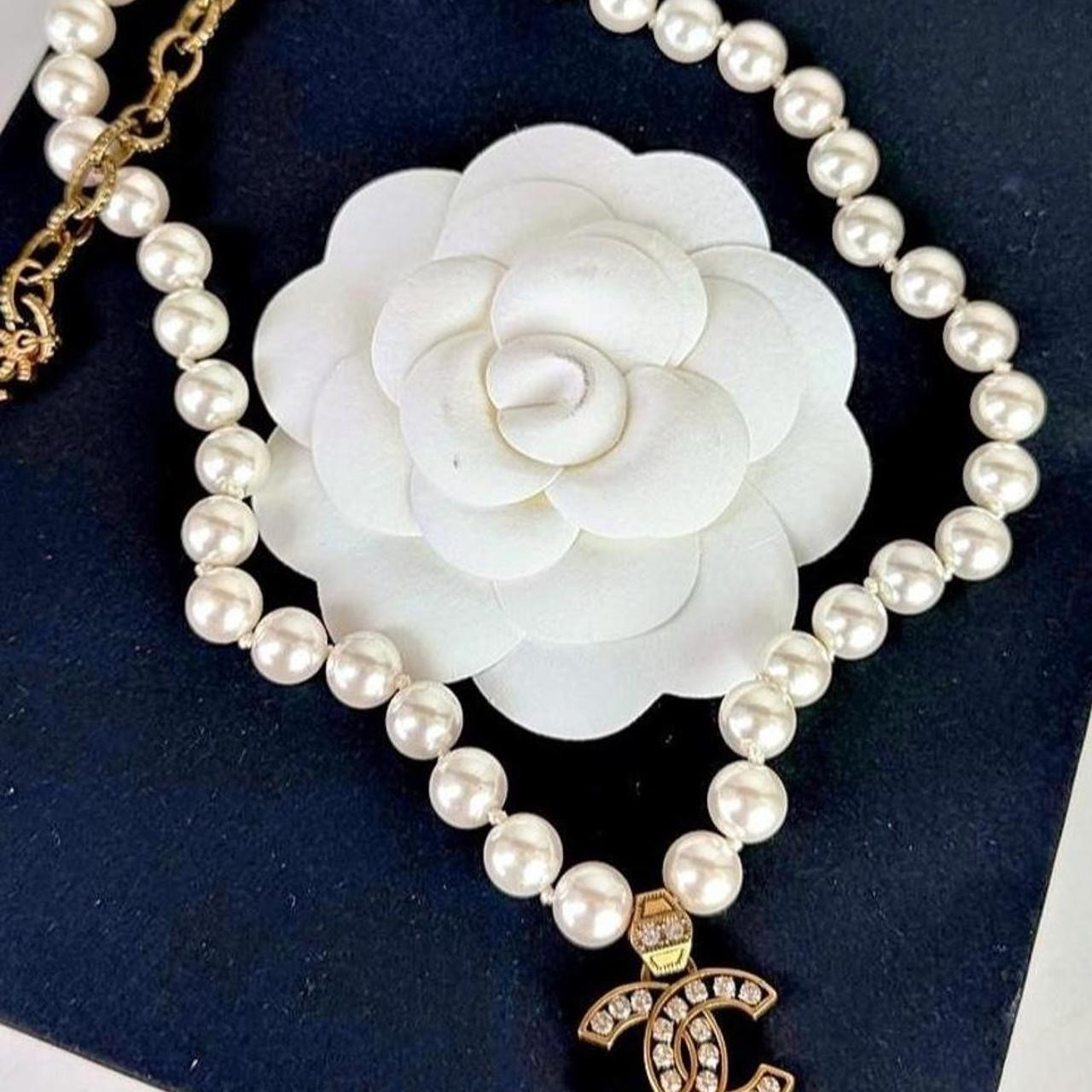 Chanel white pearl necklace with gold hardware and crystal accents