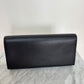 Black YSL Monogram Kate Tassel Clutch Bag with gold tassel