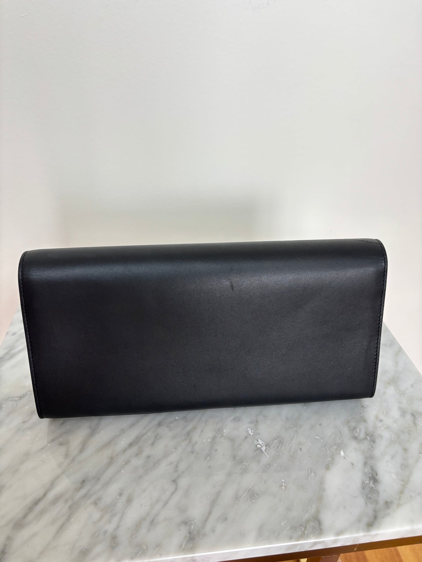Black YSL Monogram Kate Tassel Clutch Bag with gold tassel