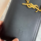 Black YSL Monogram Kate Tassel Clutch Bag with gold tassel