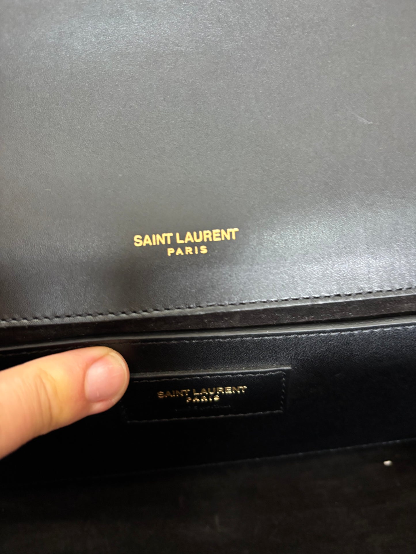 Black YSL Monogram Kate Tassel Clutch Bag with gold tassel