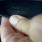 Black YSL Monogram Kate Tassel Clutch Bag with gold tassel