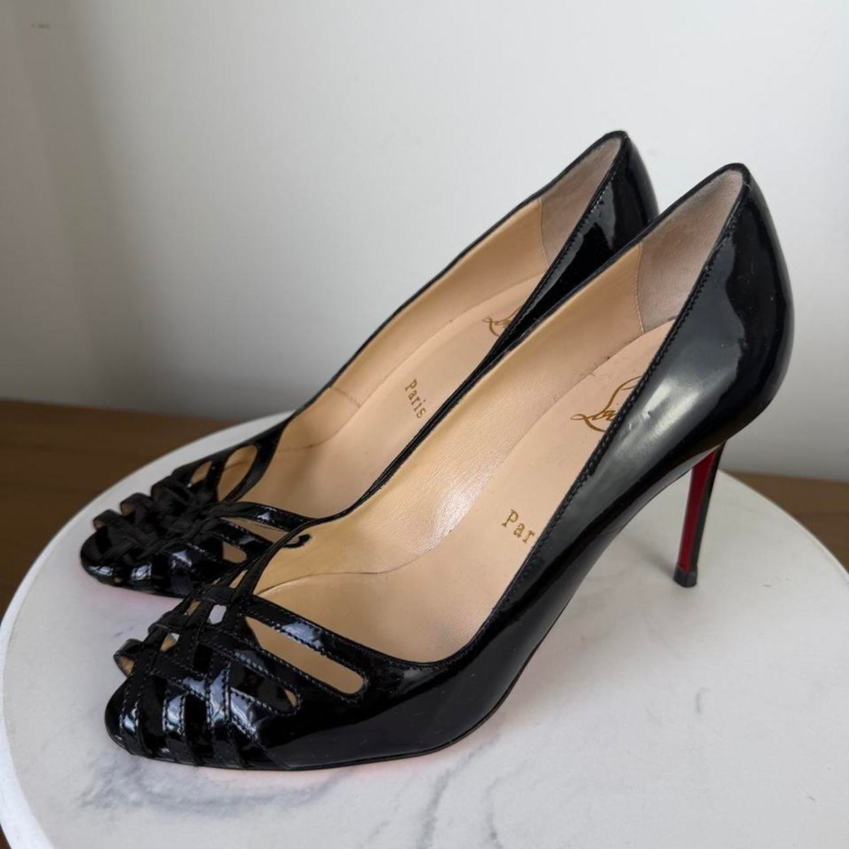 Christian Louboutin black patent leather peep toe heels with red sole #glamour #luxury