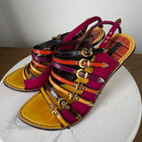 Louis Vuitton multicolored sandals with gold buckles and straps in magenta, orange, and yellow #luxury #designer