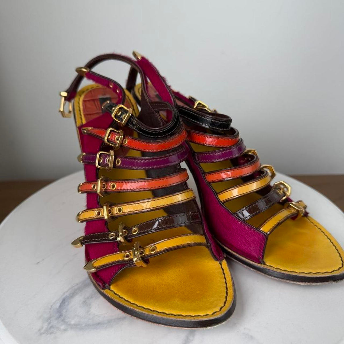 Louis Vuitton multicolored sandals with gold buckles and straps in magenta, orange, and yellow #luxury #designer