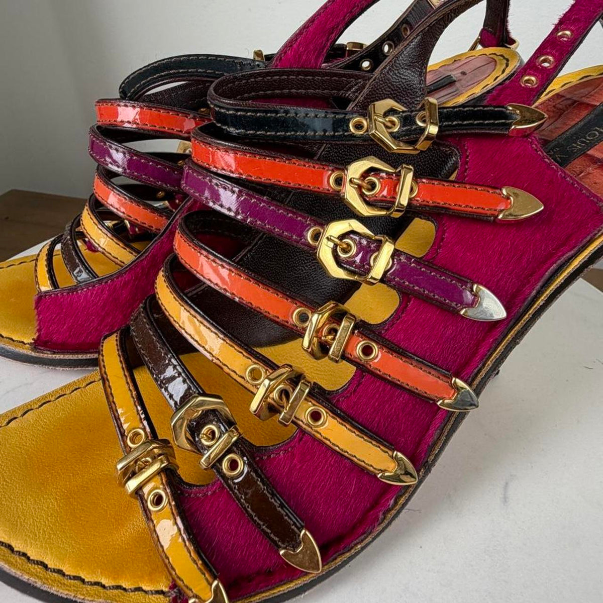 Louis Vuitton multicolored sandals with gold buckles and straps in magenta, orange, and yellow #luxury #designer