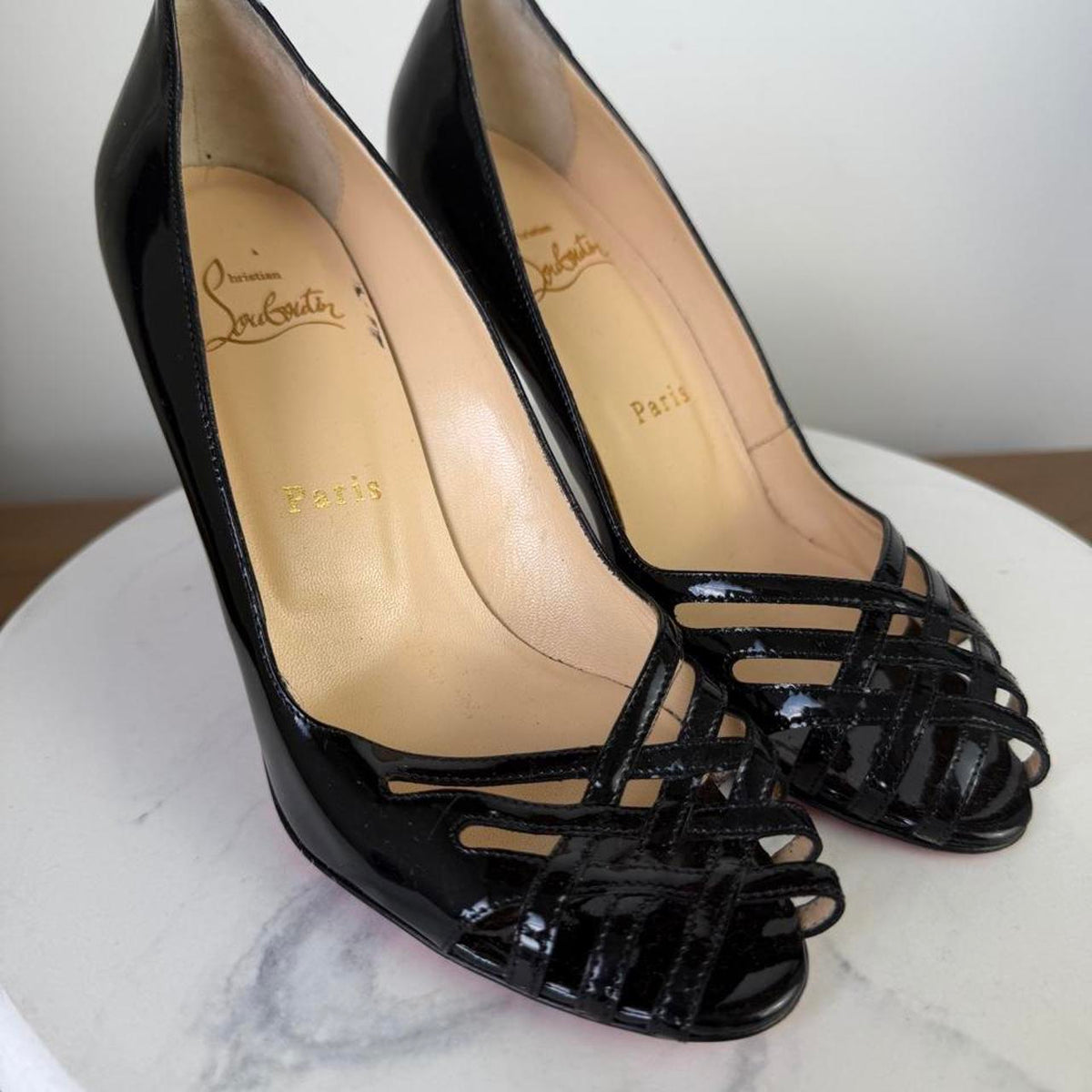 Christian Louboutin black patent leather peep toe heels with red sole #glamour #luxury