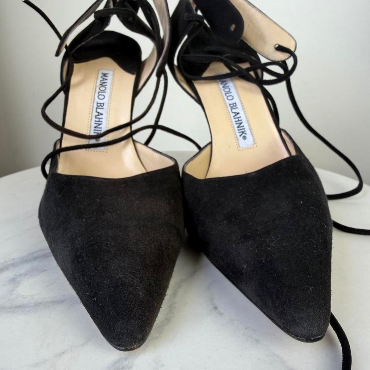 Manolo Blahnik black suede heels with lace up detail #luxury #designer